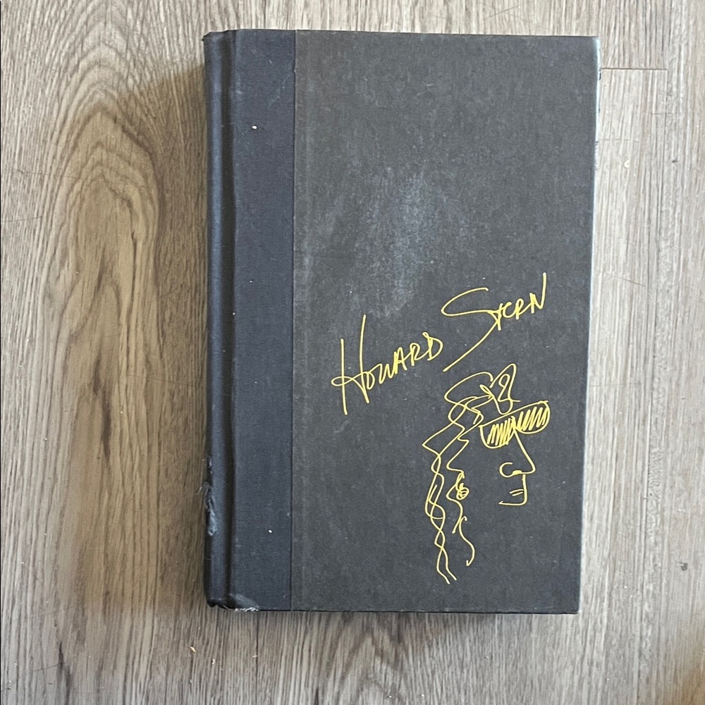 Howard Stern Book with Yellow Line Art Accent